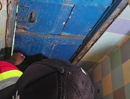 Two Construction Workers Making Out in the Company Bathroom.