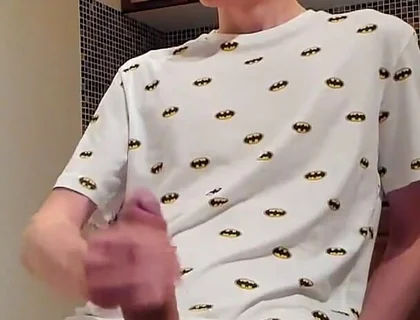 Sweet load of cum flows from this cute guy's big cock