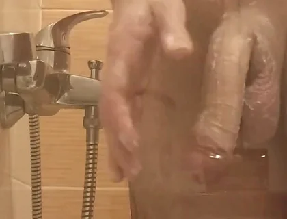 A Young Guy Washes in the Shower and Dreams of Someone Being Next to Him