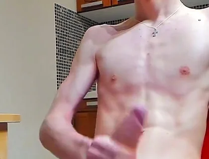 A young beautiful gay twink fucks a vibrator