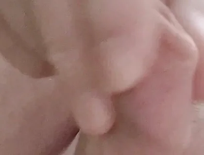 My Friend Sits in a Chair and Plays with His Little Cock and Watches Videos He Likes to Watch Videos Means He Watches Videos